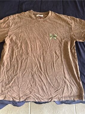 Men’s Brown Crewneck T-Shirt with Small Chest Bow Accent
